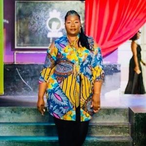 A shirt dress with concealed buttons